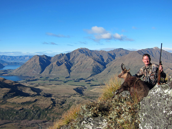 Erik Eike with Chamois on steep cliffs
